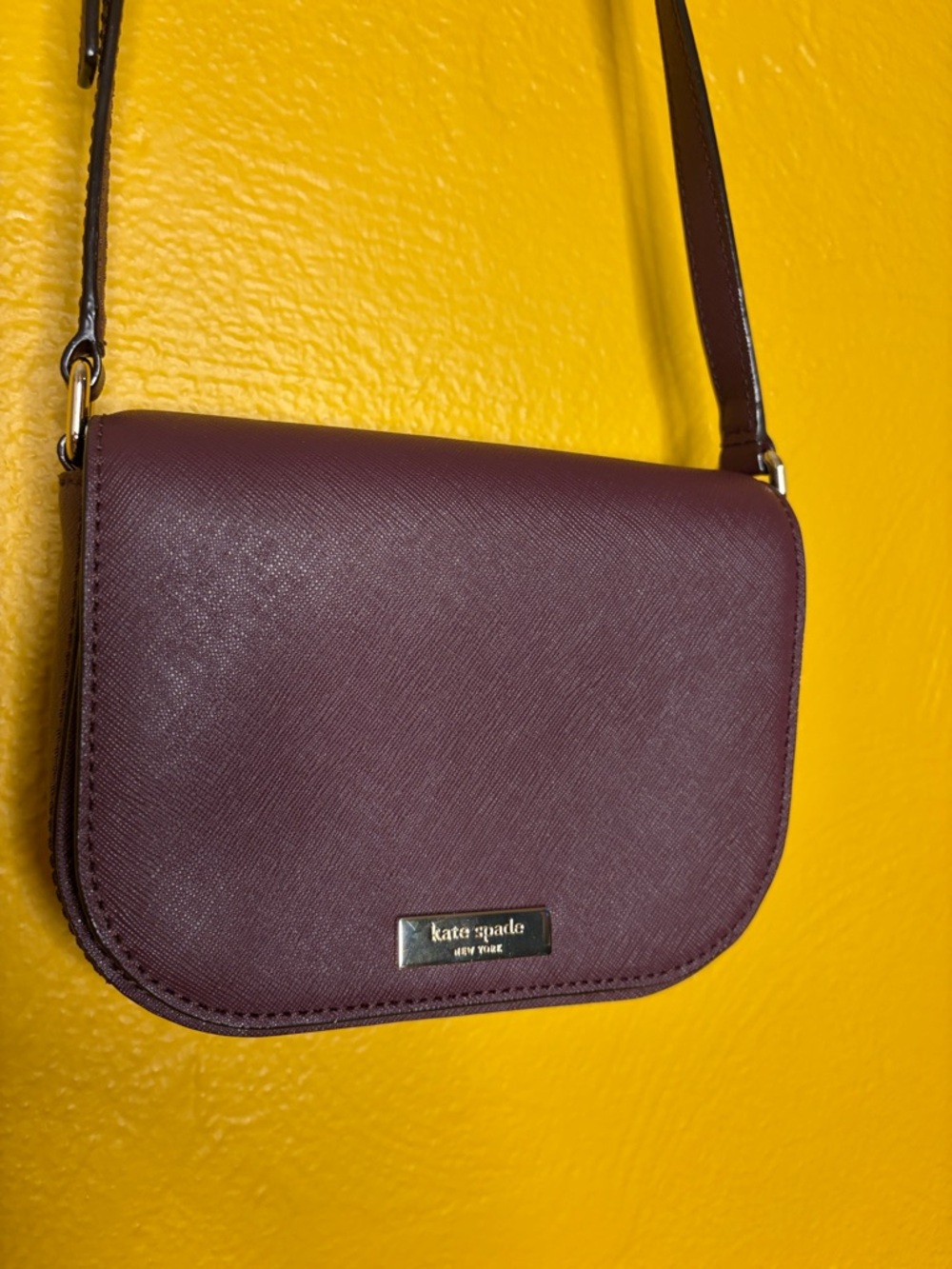 Kate Spade Laurel Way Carsen crossbody Saffiano leather Plum Sm 7”Wx6”Hx2.5”Deep